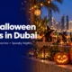Halloween celebrations in Dubai with glowing pumpkins, a family and the illuminated skyline.